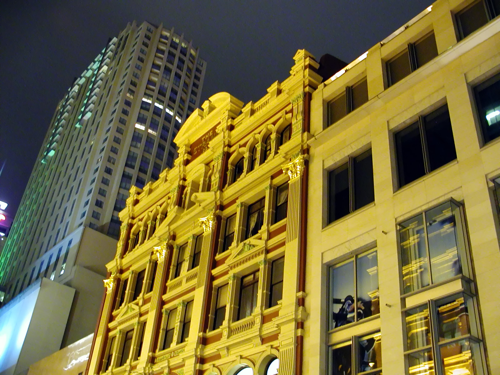 16-Jun-2001 22:16 - Sydney - Shop roofline on Pitt Street, with the Merchant Court Hotel in the background