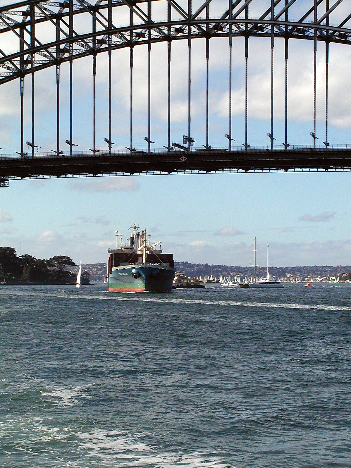 17-Jun-2001 11:20 - Sydney - Container ship passing under the harbour bridge