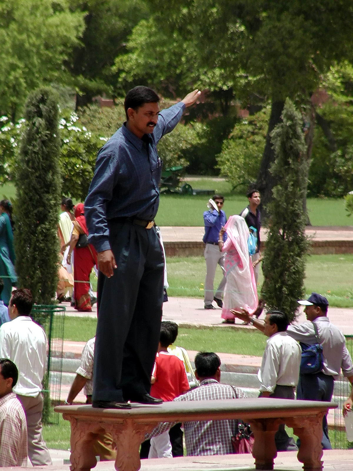 10-Jun-2001 12:11 - Agra - The Taj Mahal - Photo point .. the person being photographed is trying to appear to be pointing to the top of the Mausoleum