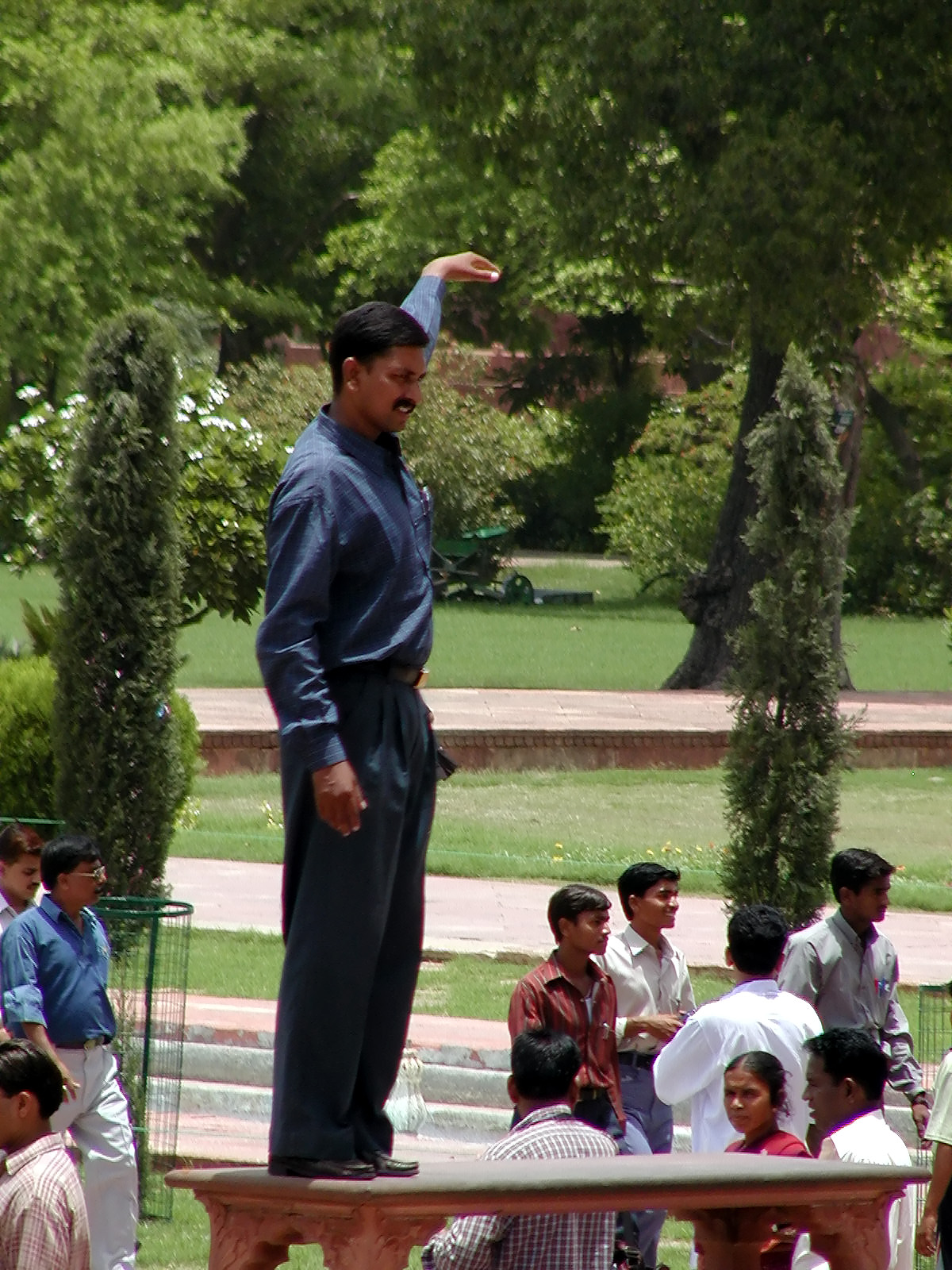 10-Jun-2001 12:11 - Agra - The Taj Mahal - Photo point .. the person being photographed is trying to appear to be pointing to the top of the Mausoleum