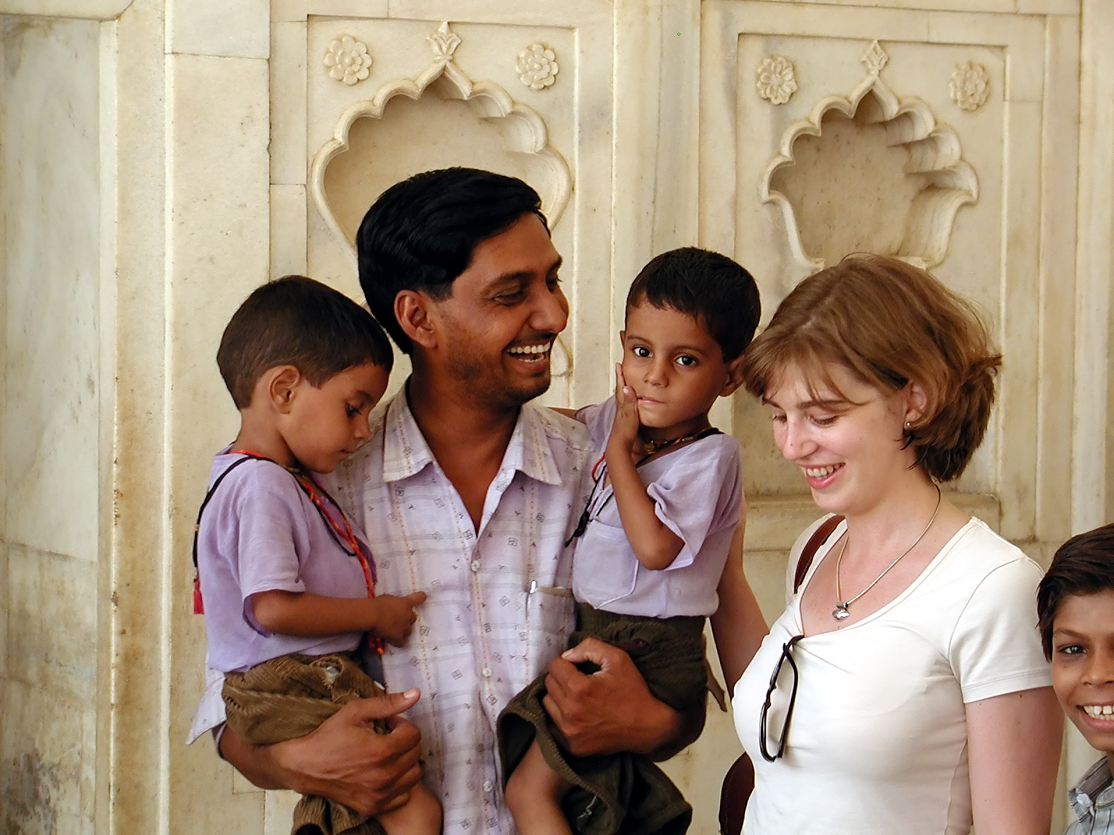 10-Jun-2001 14:00 - Agra - Agra Fort - Indian family wanting their photo taken with one member of our tour group