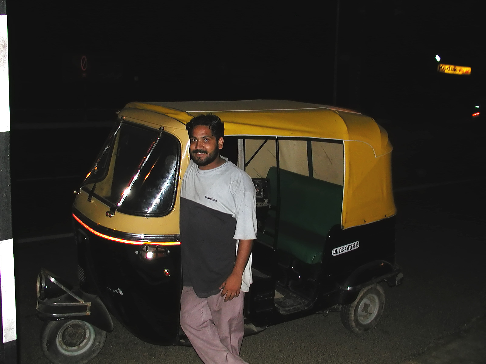 11-Jun-2001 21:33 - Delhi - The driver and our auto-rickshaw