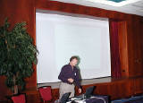23-Oct-2001 14:16 - Amsterdam - James de Raeve - James de Raeve (The Open Group) summarized the Testing and Certification side of The Open Group's business: 

Why Standards are useful - historically and up to the present day 
Standards-based trade - what it leads to, so that test results are fair, repeatable, and usable. 
Success in the marketplace - what this means 
Barriers we have to overcome  to ensure successful delivery of our test and certification business 
July's breaking news for this business - the Open Services Gateway initiative (OSGi) 
Purpose of a Certification Policy - including the value of using trademarks, testing to verify conformance, subsequent re-testing  to assure continued conformance, handling of non-conformance problem reports through a timely resolution process, and our appeals process to resolve disputes. He noted that confidentiality is also important until the certifier is ready to go public. 
James concluded that The Open Group has demonstrated a proven business in delivering high quality test and certification services to a number of business areas, some deriving from Open Group standards, and others from contracts with other standards organizations and consortia, all to the benefit of the purchasers of information systems products.
