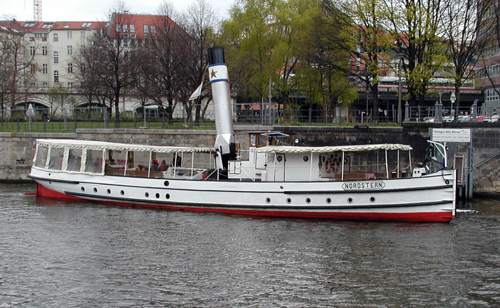 Boat trip - old steam boat with hinged funnel