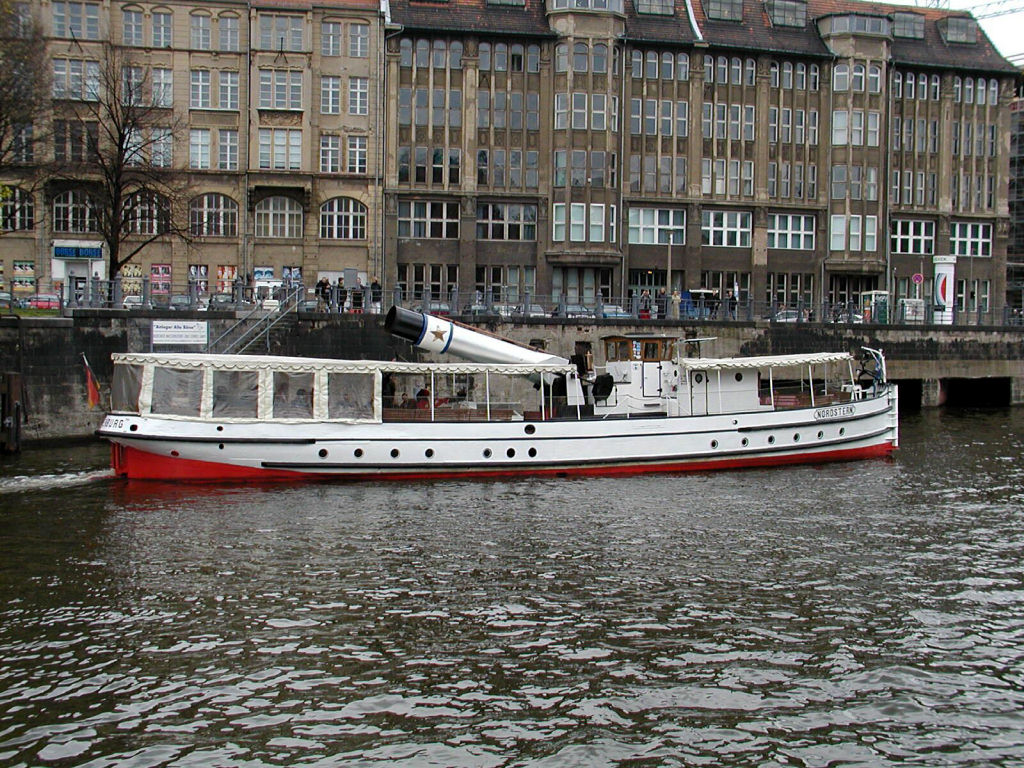 Boat trip - old steam boat with hinged funnel