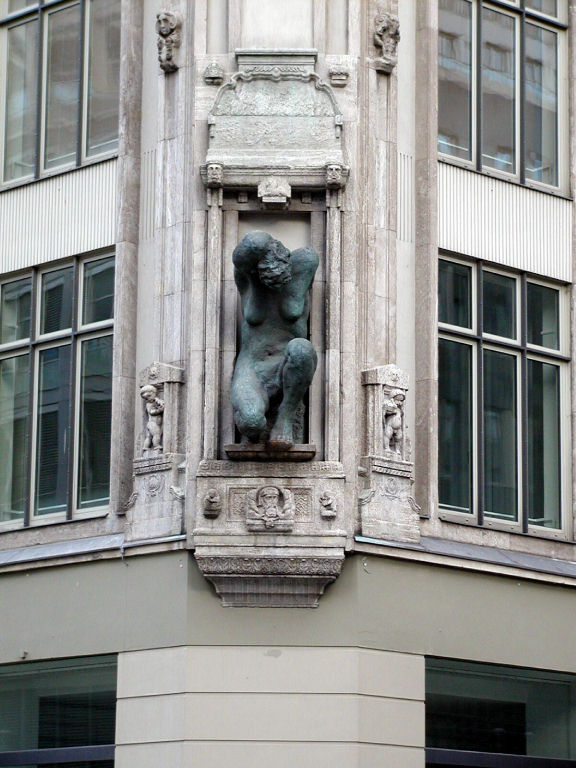 Statue on shop corner