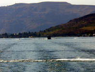 30-Jul-2000
Lake Chelan, WA
Looking back towards the Chelan end of the lake
The boat behind is the Lady of the Lake II, the slower of the two boats in daily service.